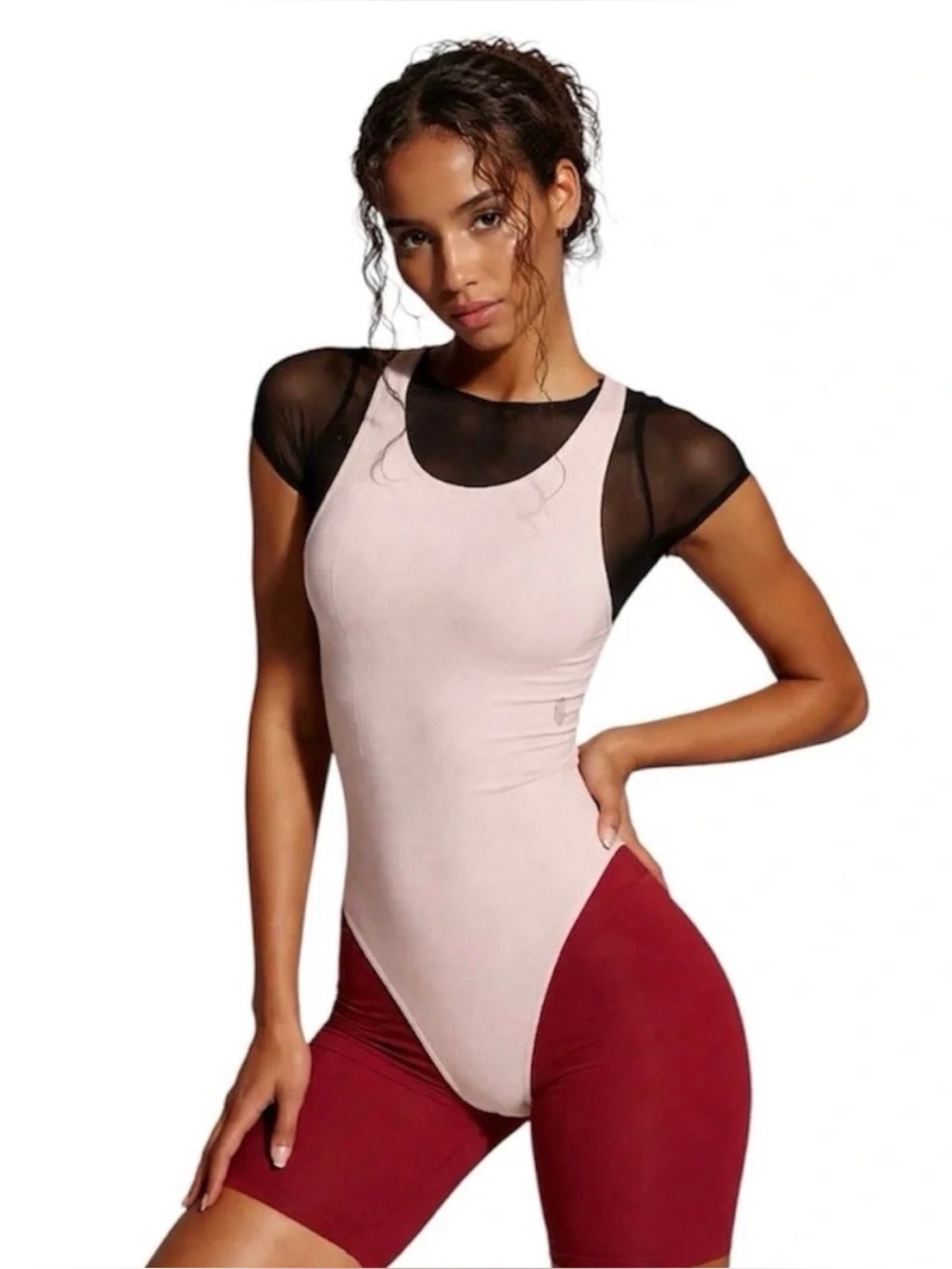 FP Movement by Free People Pale Pink Ribbed Bodysuit